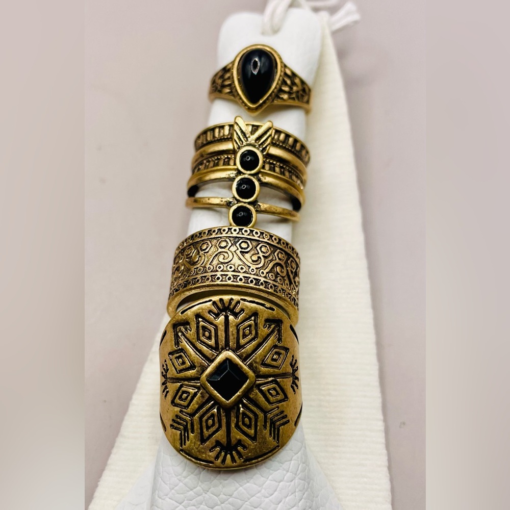 Free People 5 stacked gold tone and black stone rings. Many designs. Size 6 1/2